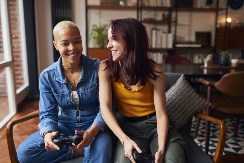 Friends playing video games together